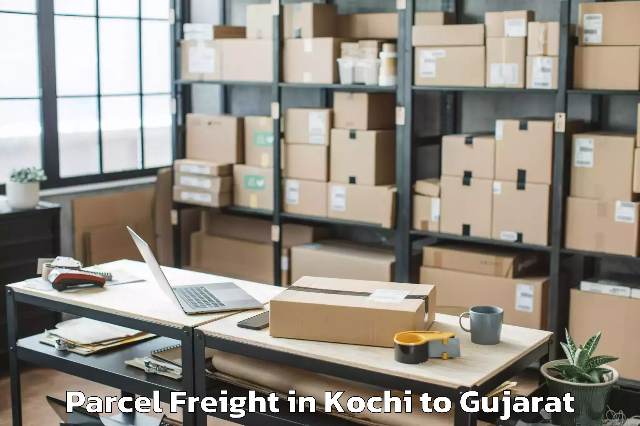 Discover Kochi to Songadh Parcel Freight